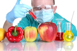 Scientist injecting GMO into the vegetables