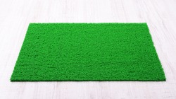 Green carpet on floor close-up