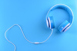 Headphones on blue background