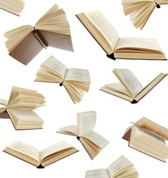 Many flying books as background isolated on white