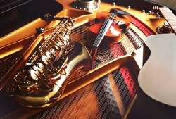 Musical instruments lying on piano, close up