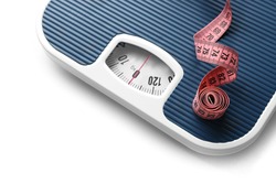 Bathroom scale with measuring tape on white background. Weight loss concept