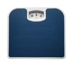 Bathroom scale on white background. Weight loss concept