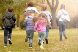 Sporty children running in the park