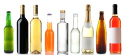 Bottles with different drinks on white background