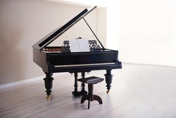 Classic piano in empty room