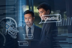 two asian business man working together using laptop computer getting help from AI ChatBot