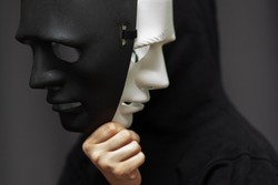 personality mask, spy,hypocrisy, falsification of documents,hooded man with black white disguises
