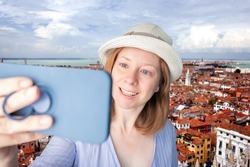 tourist takes a selfie with landmarks, italian travel, tourist international trip,tourism and travel, happy woman in a hat is photographed against the background of venice in Italy