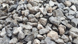 Gravel outdoor  road. Closeup gravel texture. Stone pattern. Small rocks ground