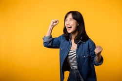 Portrait young asian woman proud and confident showing strong muscle strength arms flexed posing, feels about her success achievement. Women empowerment, equality, healthy strength and courage concept