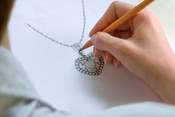 Drawing Jewelry Design. Drawing sketch jewelry on paper . Design Studio. Creativity Ideas.
