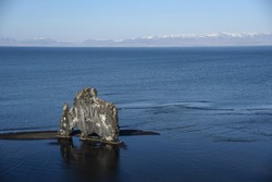 View of basalt stack Hvitserkur (Dinosaur rock) at Vatnsnes peninsula in the morning in Iceland.