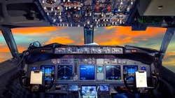 airplane cockpit Flight Deck in sunset