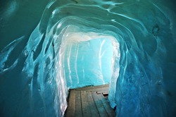 Footbridge Inside The Ice Cave on Furka Pass (Eisgrotte am Rhonegletscher), Alps, Valais, Switzerland