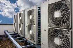 Air conditioning system assembled on top of a building.