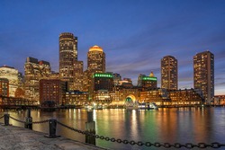 Boston skyline from Fan Pier at the fantastic twilight time with smooth water river in boston, Massachusetts, USA downtown skyline, Architecture and building with tourist and travel concept