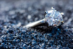 A precious ring with a polished gemstone
