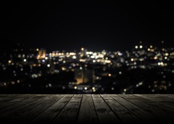 View from wooden plank above phuket town at night