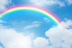 Blue sky and clouds with rainbow.
