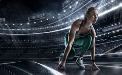 Sports background. Runner on the start line of the glowing stadium . Futuristic running track. Dramatic picture.