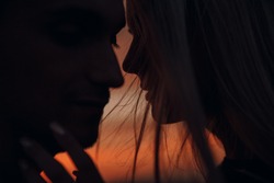 Couple in love.Couple together.Couple at sunset.Love.Feeling.Silhouette photo