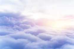 Sunny sky abstract background, beautiful cloudscape, on the heaven, view over white fluffy clouds, freedom concept