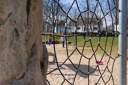 Playground with climbing wall and web rope climber