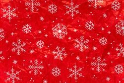 Colorful holiday Christmas crumpled wrapping paper background.