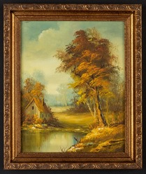 Framed vintage oil painting depicting a small cabin house near a lake and woods.