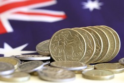 Australian dollars with Australian flag background.