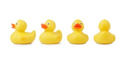 Cute yellow rubber duckling on different perspective, isolated on white. Clipping path included.