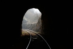 Tunnels and railways. Light on the end of the tunnel