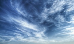 Texture of bright blue dramatic cloudy sky