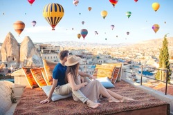 Happy couple in Cappadocia. Couple travels the world. Hot air balloon flights.