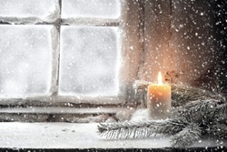 candle and snow 