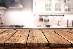 worn table of wood in kitchen 