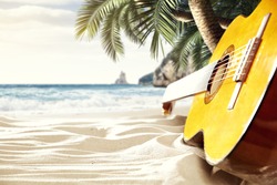 relax on the beach with a hot guitar
