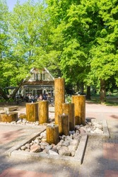Fountain in front of the cafe in the city park of Nordhorn, Germany