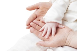 hand of a child in mother's hands isolated on a white background