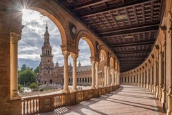 Spanish Square or Plaza de Espana at sunny day in Seville, Andalusia, Spain. Beautiful passageway without people