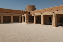Zubara historical fort located in norther Qatar, high walls and four towers on corners made in traditional way, Zubarah travel and tourism Doha 2022