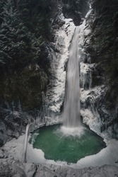 Frozen waterfall at Cascade Falls in Mission BC. Very rare event, the snowfall happens once an year in this area, changing the look completely.