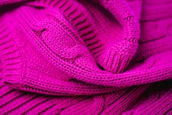Magenta color texture background, knitted fabric background