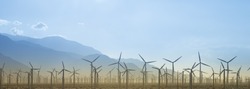 Windmill Farm Silhouette With Mountains