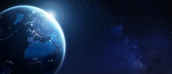 Earth viewed from space for global business, technology, finance, worldwide communications, internet concepts. Wide panoramic background for banner. World with city light in Europe. Elements from NASA