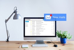 Receiving email in inbox concept with popup notification of new unread mails appearing on computer screen, marketing, spam