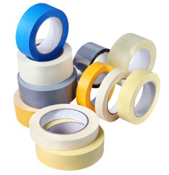 Office supplies, a set of rolls adhesive tape, paper, plastic, various colors and thickness for various purposes, isolated on white background