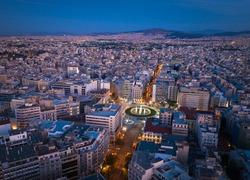 Omonia square aerial view at night time, Athens city center view from the sky. Aerial drone view of night Athens, Greece