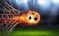 Fiery Soccer Ball In Goal With Net In Flames
